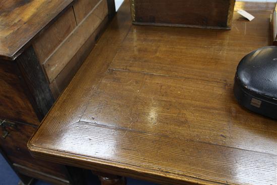 A 19th century provincial French oak and fruitwood rectangular dining table, 6ft 10.5in. x 3ft 3in.